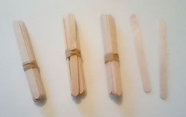 3 groups of 10 and 2 single craft sticks